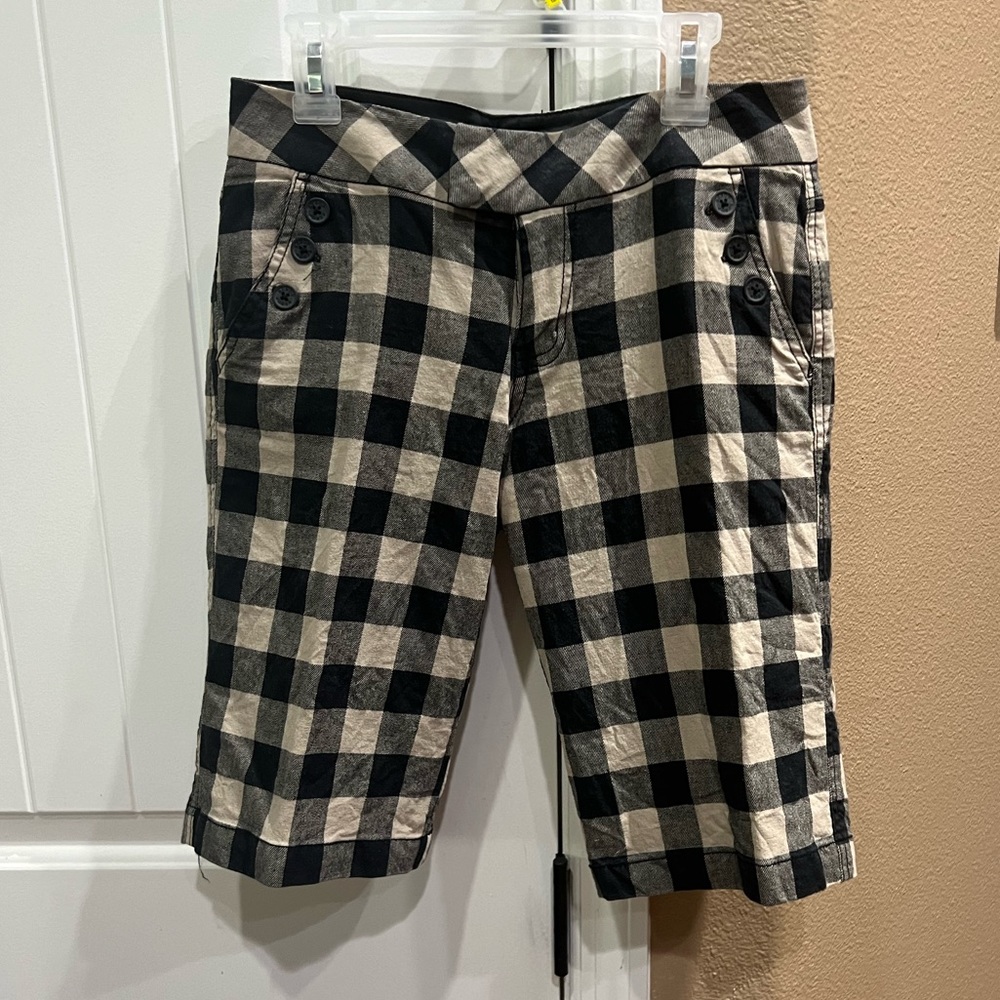 Black and tan knee length shorts